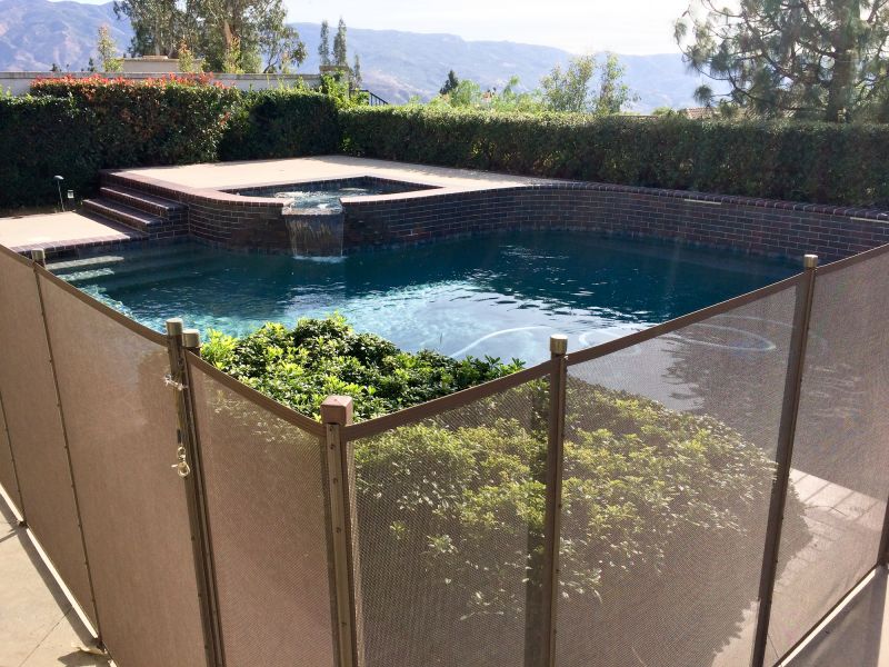 Removable Mesh Pool Fence in Action